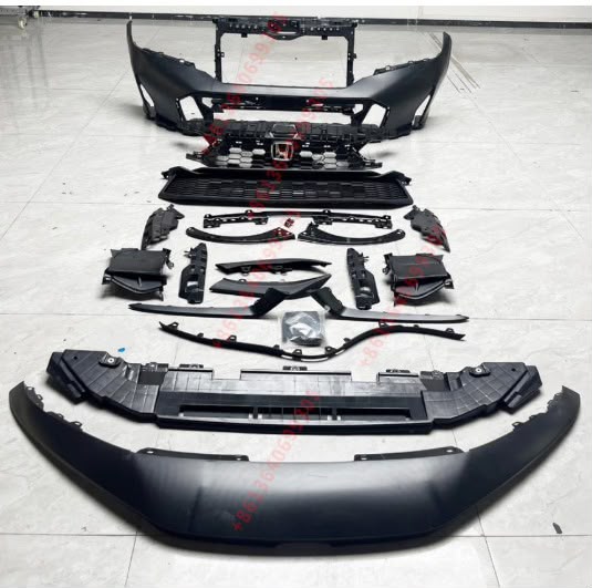 Complete vehicle front body kit arranged for inspection