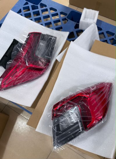 Pair of new wrapped Honda tail light assemblies