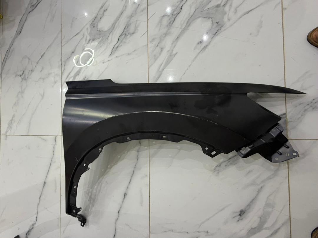 Black vehicle front fender panel
